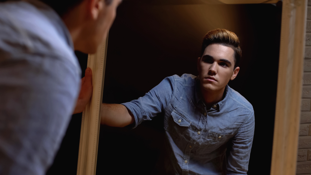 Transgender man struggling with gender dysphoria