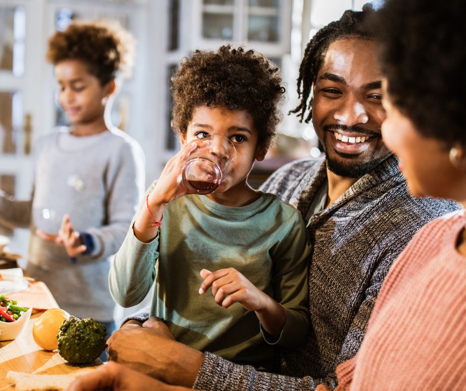 BIPOC Mental Health Month - Black family at dinner table