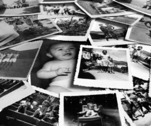 Old photos spread on a table - brain health and memories